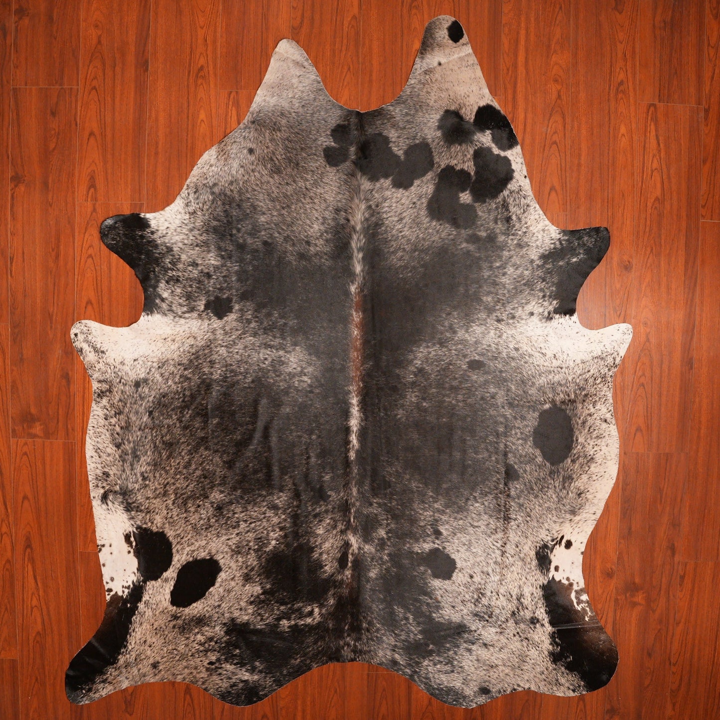 The Nguni Guy Nguni cowhide African decor Authentic cowhide Home decor Interior design Unique pattern Hand-selected Premium quality Natural beauty Exotic rug Genuine hide Statement piece Contemporary style Ethically sourced Sustainable decor Versatile accent Luxury rug Designer piece Modern aesthetic High-end craftsmanship Timeless elegance Designer home accents