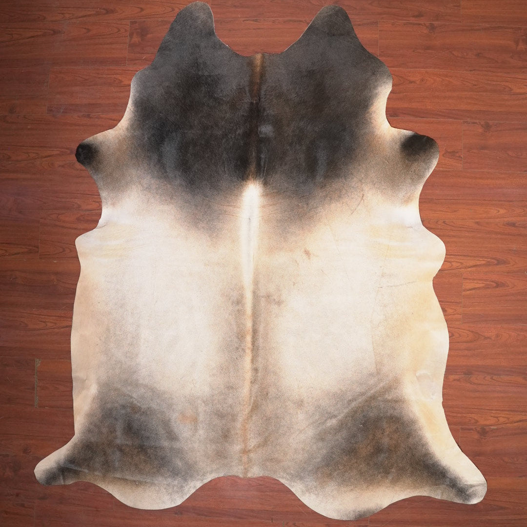 The Nguni Guy Nguni cowhide African decor Authentic cowhide Home decor Interior design Unique pattern Hand-selected Premium quality Natural beauty Exotic rug Genuine hide Statement piece Contemporary style Ethically sourced Sustainable decor Versatile accent Luxury rug Designer piece Modern aesthetic High-end craftsmanship Timeless elegance Designer home accents