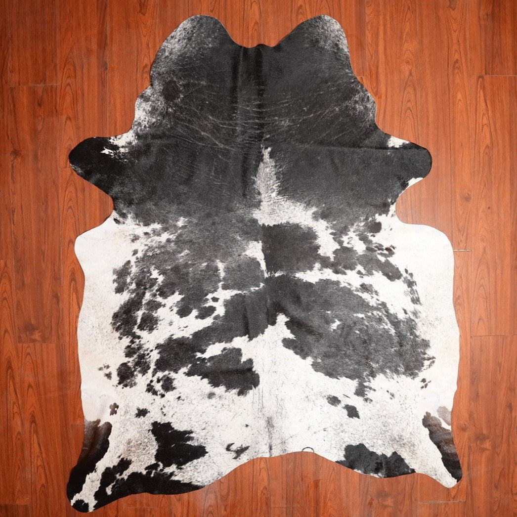 The Nguni Guy Nguni cowhide African decor Authentic cowhide Home decor Interior design Unique pattern Hand-selected Premium quality Natural beauty Exotic rug Genuine hide Statement piece Contemporary style Ethically sourced Sustainable decor Versatile accent Luxury rug Designer piece Modern aesthetic High-end craftsmanship Timeless elegance Designer home accents