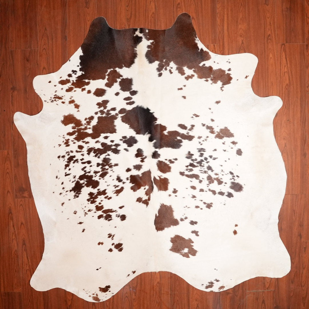 The Nguni Guy Nguni cowhide African decor Authentic cowhide Home decor Interior design Unique pattern Hand-selected Premium quality Natural beauty Exotic rug Genuine hide Statement piece Contemporary style Ethically sourced Sustainable decor Versatile accent Luxury rug Designer piece Modern aesthetic High-end craftsmanship Timeless elegance Designer home accents