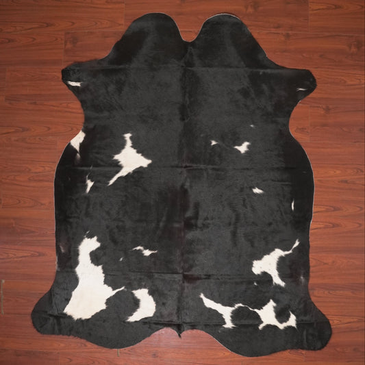 The Nguni Guy Nguni cowhide African decor Authentic cowhide Home decor Interior design Unique pattern Hand-selected Premium quality Natural beauty Exotic rug Genuine hide Statement piece Contemporary style Ethically sourced Sustainable decor Versatile accent Luxury rug Designer piece Modern aesthetic High-end craftsmanship Timeless elegance Designer home accents