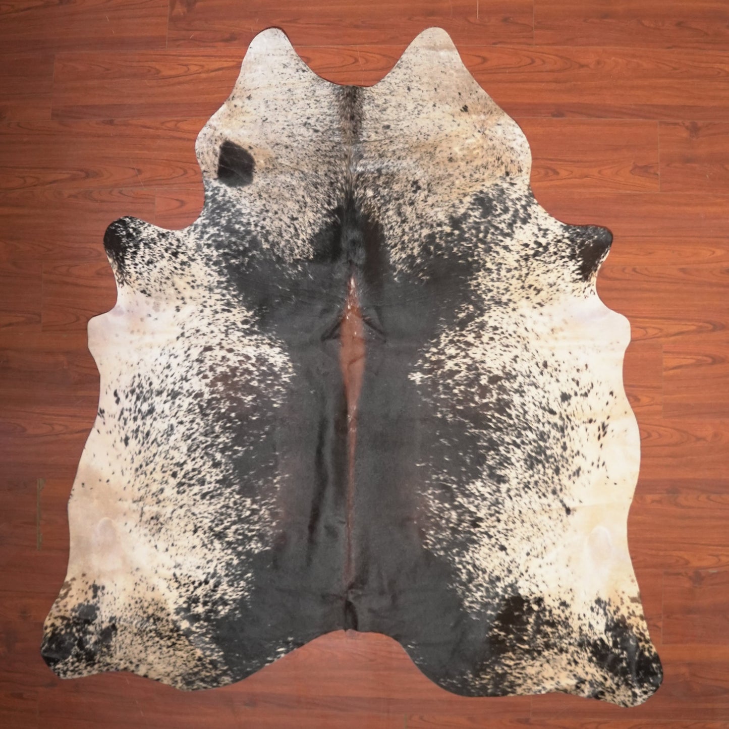 The Nguni Guy Nguni cowhide African decor Authentic cowhide Home decor Interior design Unique pattern Hand-selected Premium quality Natural beauty Exotic rug Genuine hide Statement piece Contemporary style Ethically sourced Sustainable decor Versatile accent Luxury rug Designer piece Modern aesthetic High-end craftsmanship Timeless elegance Designer home accents