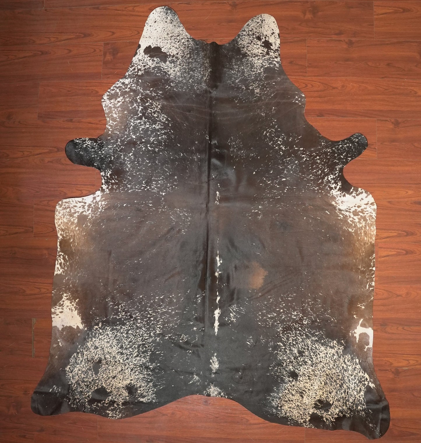 The Nguni Guy Nguni cowhide African decor Authentic cowhide Home decor Interior design Unique pattern Hand-selected Premium quality Natural beauty Exotic rug Genuine hide Statement piece Contemporary style Ethically sourced Sustainable decor Versatile accent Luxury rug Designer piece Modern aesthetic High-end craftsmanship Timeless elegance Designer home accents