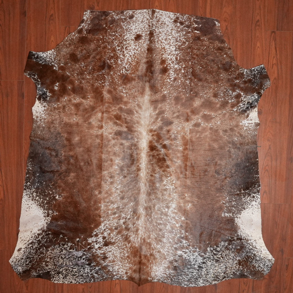 The Nguni Guy Nguni cowhide African decor Authentic cowhide Home decor Interior design Unique pattern Hand-selected Premium quality Natural beauty Exotic rug Genuine hide Statement piece Contemporary style Ethically sourced Sustainable decor Versatile accent Luxury rug Designer piece Modern aesthetic High-end craftsmanship Timeless elegance Designer home accents