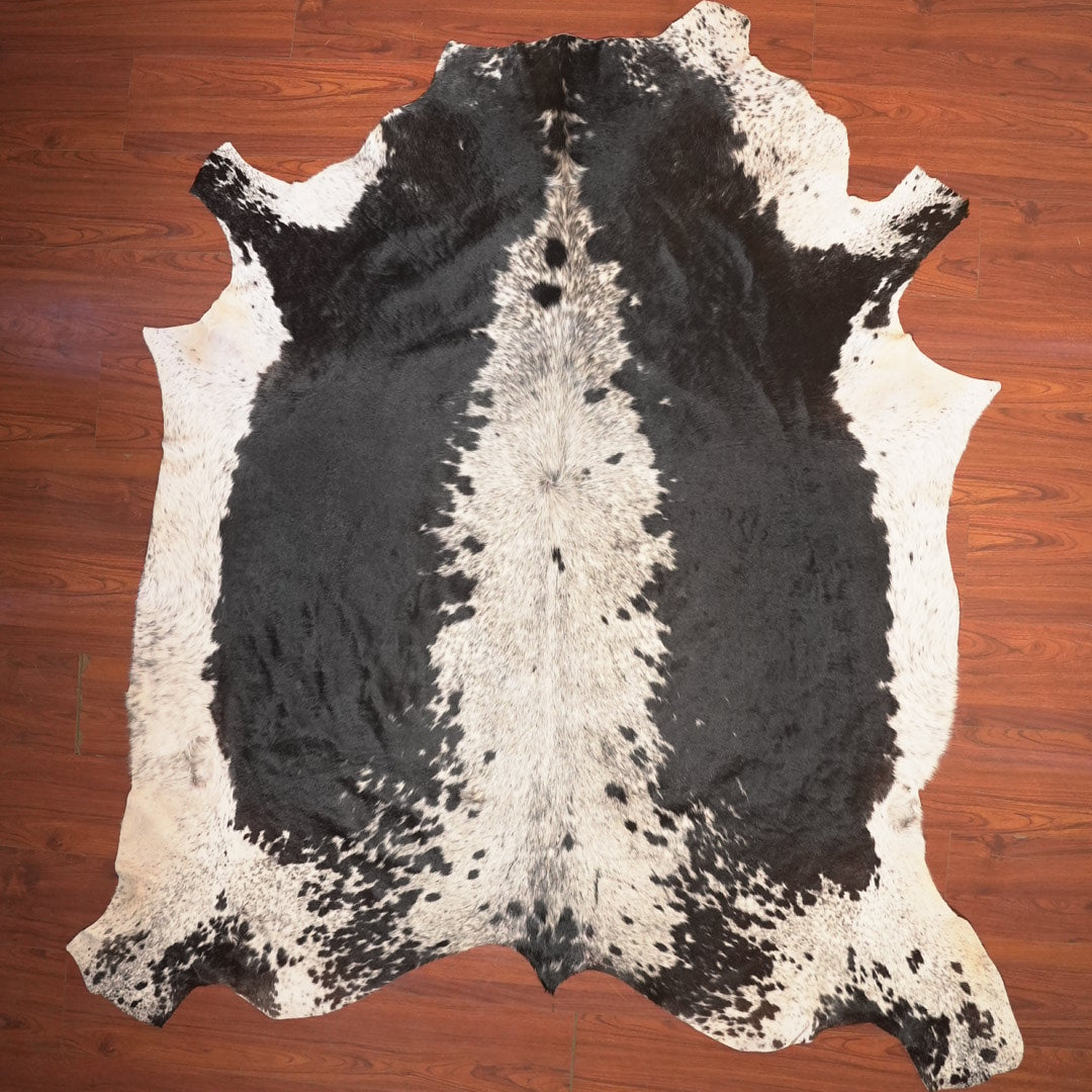 The Nguni Guy Nguni cowhide African decor Authentic cowhide Home decor Interior design Unique pattern Hand-selected Premium quality Natural beauty Exotic rug Genuine hide Statement piece Contemporary style Ethically sourced Sustainable decor Versatile accent Luxury rug Designer piece Modern aesthetic High-end craftsmanship Timeless elegance Designer home accents