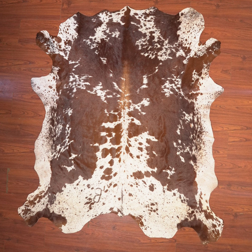 The Nguni Guy Nguni cowhide African decor Authentic cowhide Home decor Interior design Unique pattern Hand-selected Premium quality Natural beauty Exotic rug Genuine hide Statement piece Contemporary style Ethically sourced Sustainable decor Versatile accent Luxury rug Designer piece Modern aesthetic High-end craftsmanship Timeless elegance Designer home accents