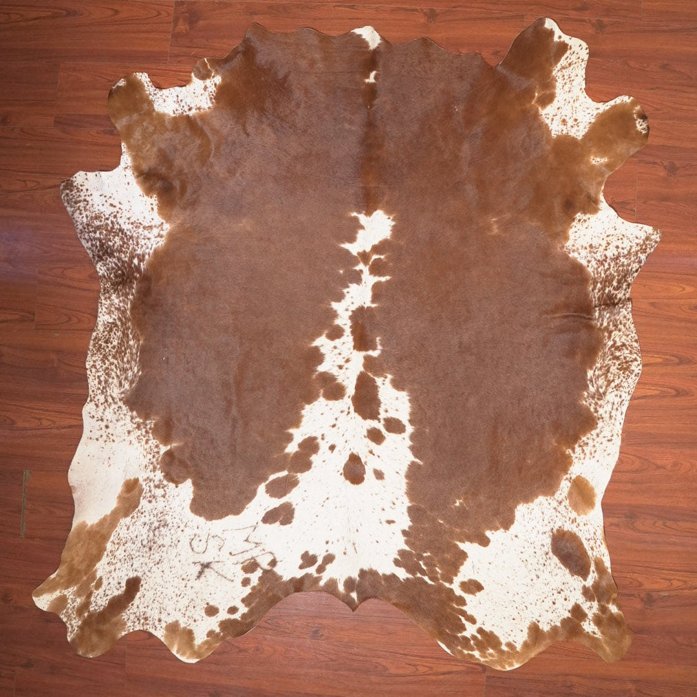 The Nguni Guy Nguni cowhide African decor Authentic cowhide Home decor Interior design Unique pattern Hand-selected Premium quality Natural beauty Exotic rug Genuine hide Statement piece Contemporary style Ethically sourced Sustainable decor Versatile accent Luxury rug Designer piece Modern aesthetic High-end craftsmanship Timeless elegance Designer home accents