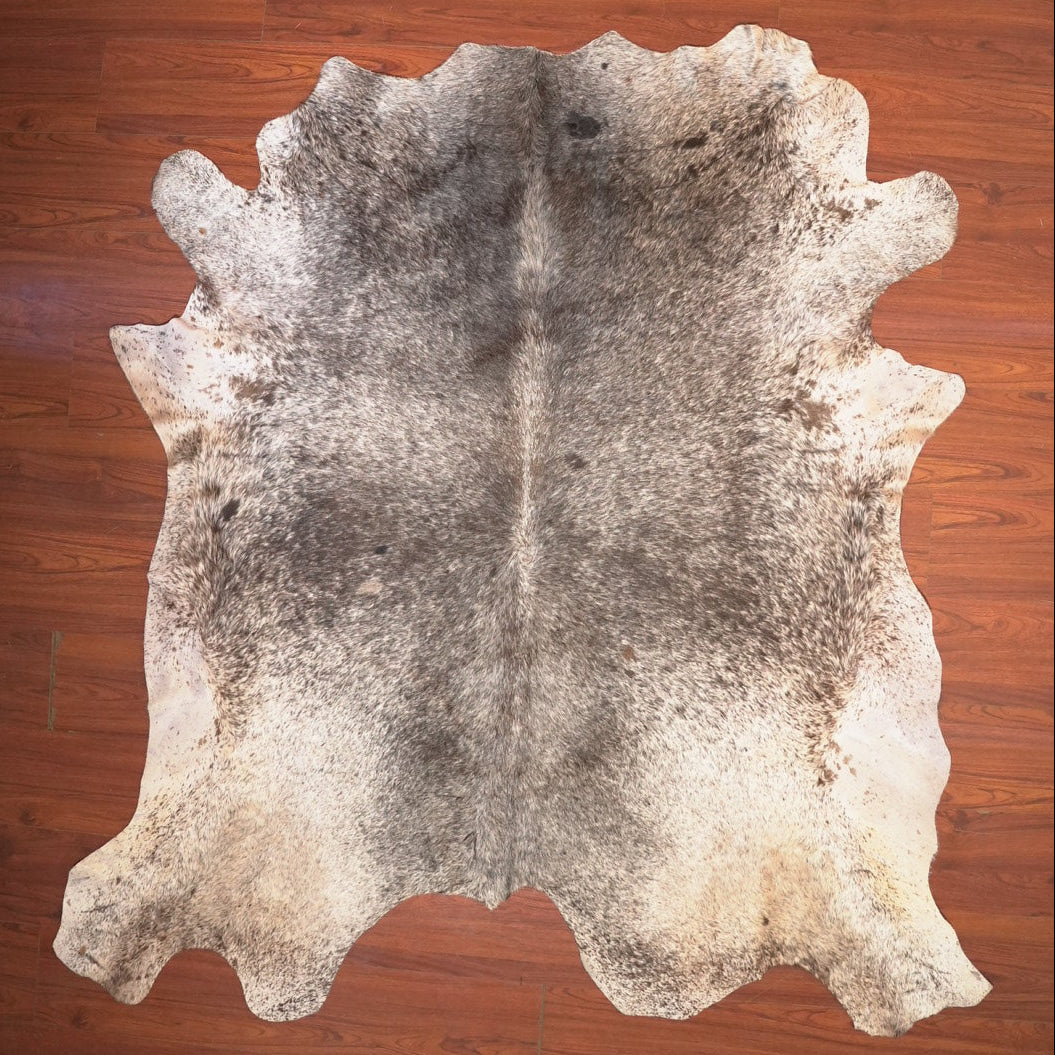 The Nguni Guy Nguni cowhide African decor Authentic cowhide Home decor Interior design Unique pattern Hand-selected Premium quality Natural beauty Exotic rug Genuine hide Statement piece Contemporary style Ethically sourced Sustainable decor Versatile accent Luxury rug Designer piece Modern aesthetic High-end craftsmanship Timeless elegance Designer home accents