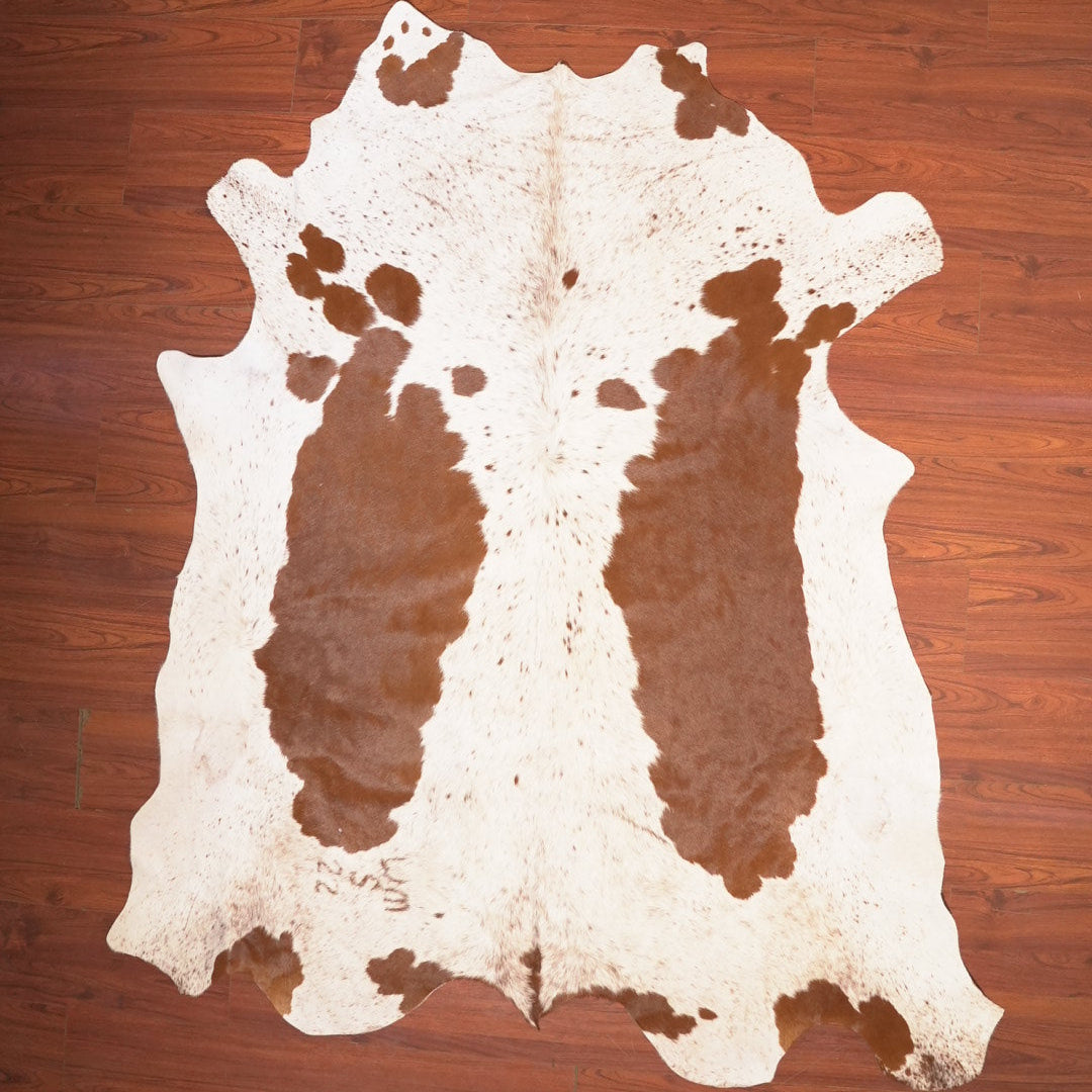 The Nguni Guy Nguni cowhide African decor Authentic cowhide Home decor Interior design Unique pattern Hand-selected Premium quality Natural beauty Exotic rug Genuine hide Statement piece Contemporary style Ethically sourced Sustainable decor Versatile accent Luxury rug Designer piece Modern aesthetic High-end craftsmanship Timeless elegance Designer home accents