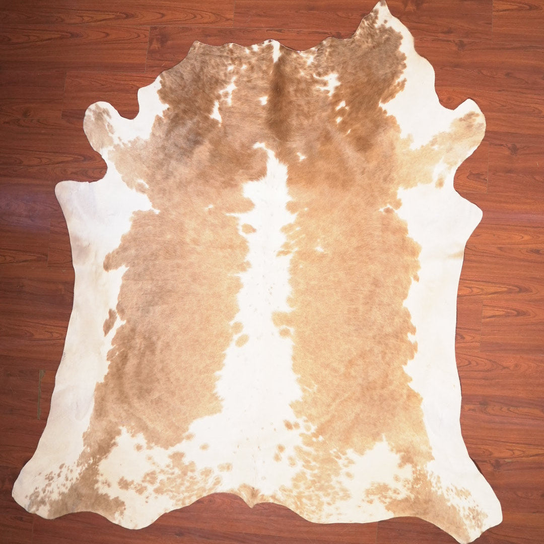 The Nguni Guy Nguni cowhide African decor Authentic cowhide Home decor Interior design Unique pattern Hand-selected Premium quality Natural beauty Exotic rug Genuine hide Statement piece Contemporary style Ethically sourced Sustainable decor Versatile accent Luxury rug Designer piece Modern aesthetic High-end craftsmanship Timeless elegance Designer home accents
