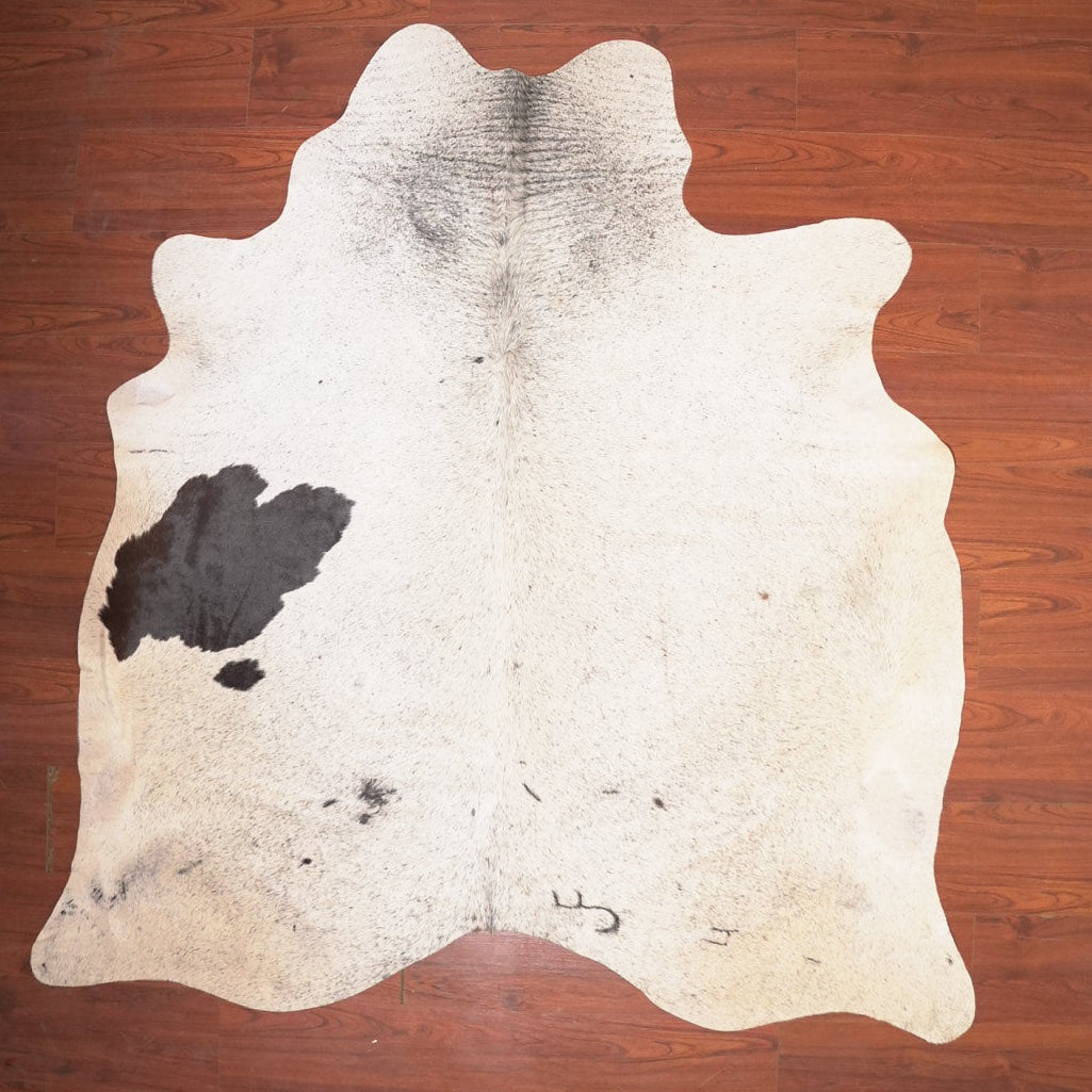 The Nguni Guy Nguni cowhide African decor Authentic cowhide Home decor Interior design Unique pattern Hand-selected Premium quality Natural beauty Exotic rug Genuine hide Statement piece Contemporary style Ethically sourced Sustainable decor Versatile accent Luxury rug Designer piece Modern aesthetic High-end craftsmanship Timeless elegance Designer home accents