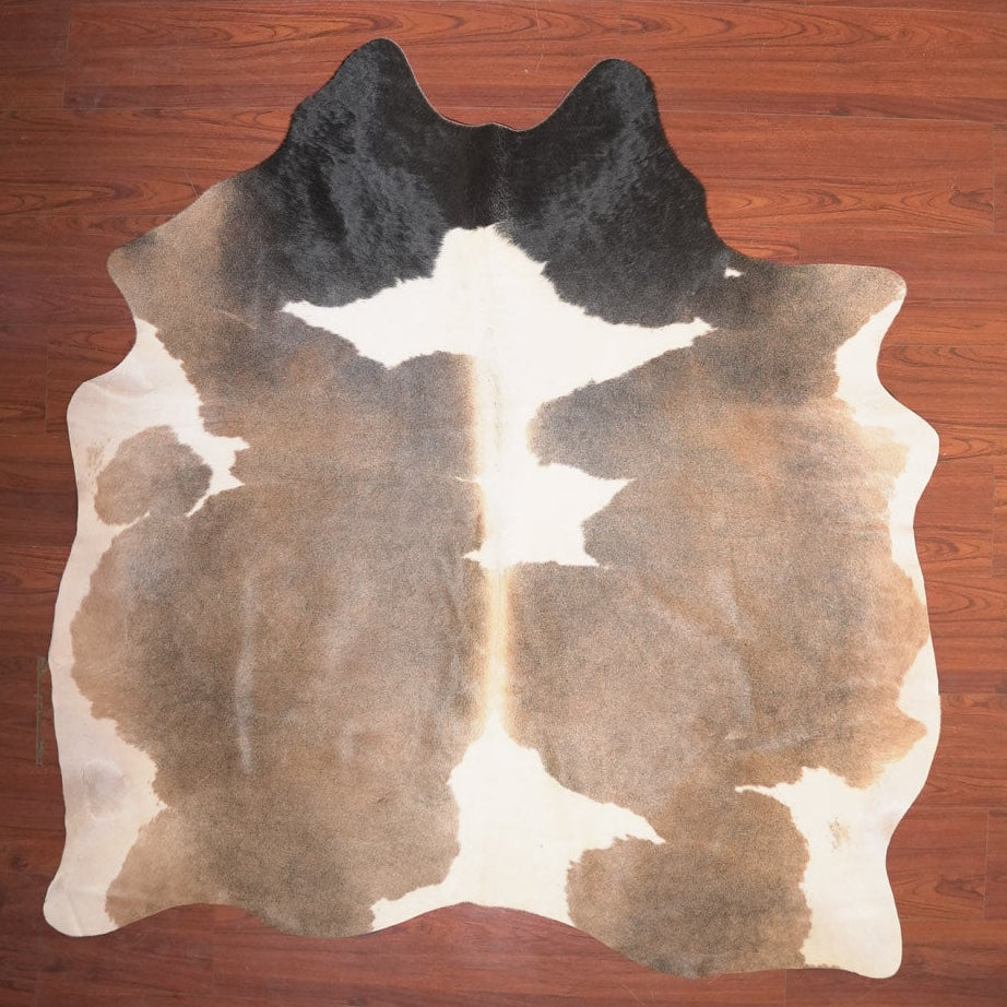 The Nguni Guy Nguni cowhide African decor Authentic cowhide Home decor Interior design Unique pattern Hand-selected Premium quality Natural beauty Exotic rug Genuine hide Statement piece Contemporary style Ethically sourced Sustainable decor Versatile accent Luxury rug Designer piece Modern aesthetic High-end craftsmanship Timeless elegance Designer home accents