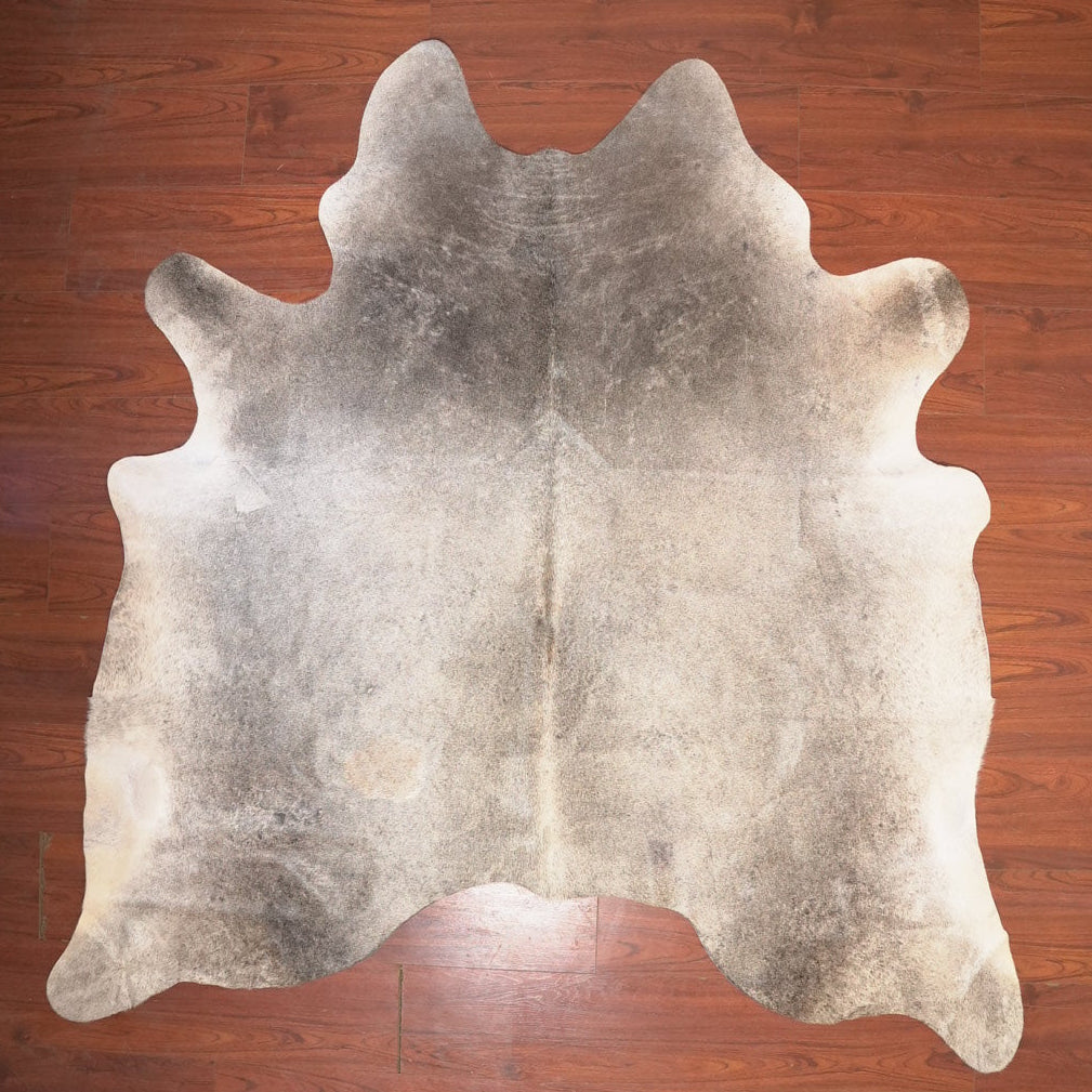 The Nguni Guy Nguni cowhide African decor Authentic cowhide Home decor Interior design Unique pattern Hand-selected Premium quality Natural beauty Exotic rug Genuine hide Statement piece Contemporary style Ethically sourced Sustainable decor Versatile accent Luxury rug Designer piece Modern aesthetic High-end craftsmanship Timeless elegance Designer home accents