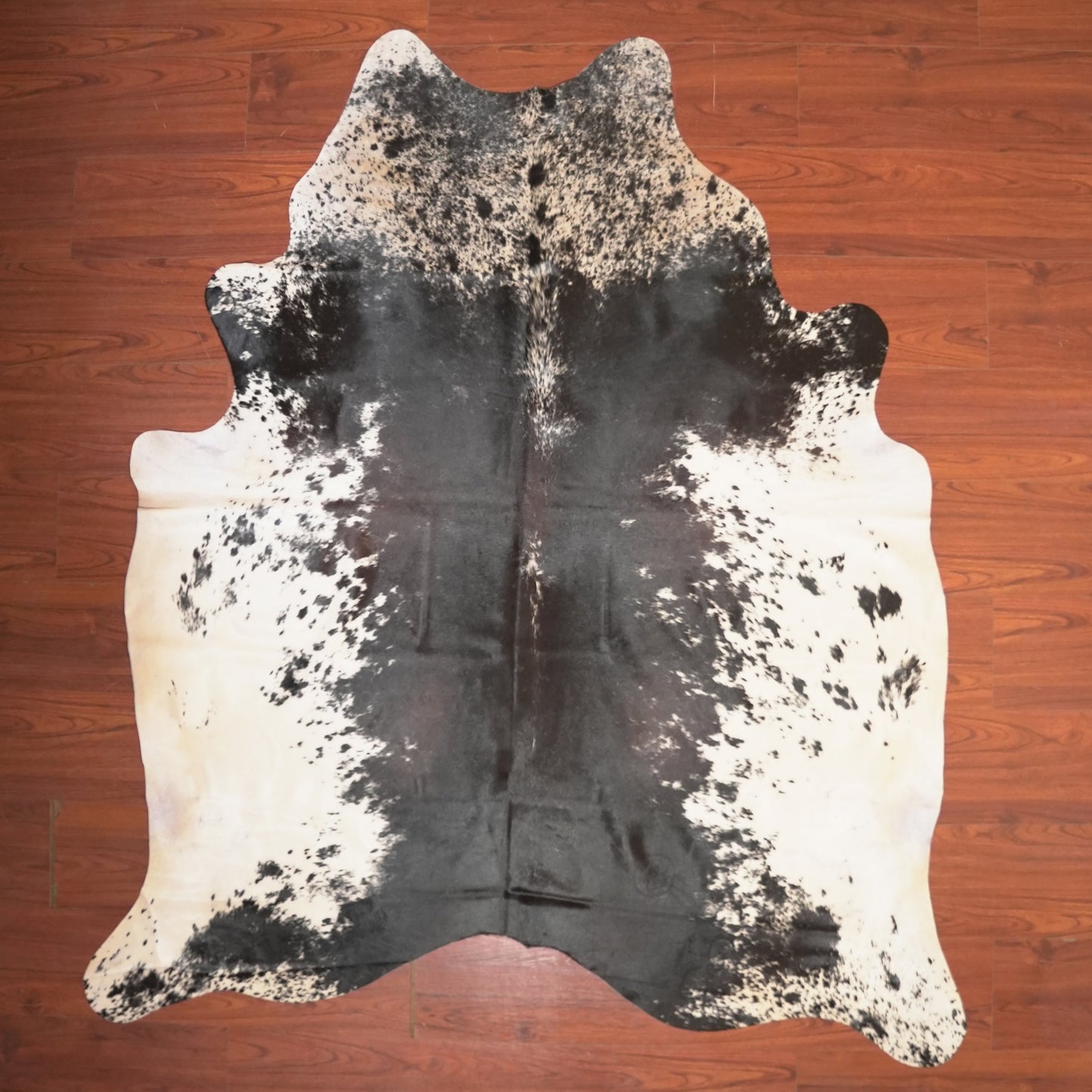 The Nguni Guy Nguni cowhide African decor Authentic cowhide Home decor Interior design Unique pattern Hand-selected Premium quality Natural beauty Exotic rug Genuine hide Statement piece Contemporary style Ethically sourced Sustainable decor Versatile accent Luxury rug Designer piece Modern aesthetic High-end craftsmanship Timeless elegance Designer home accents