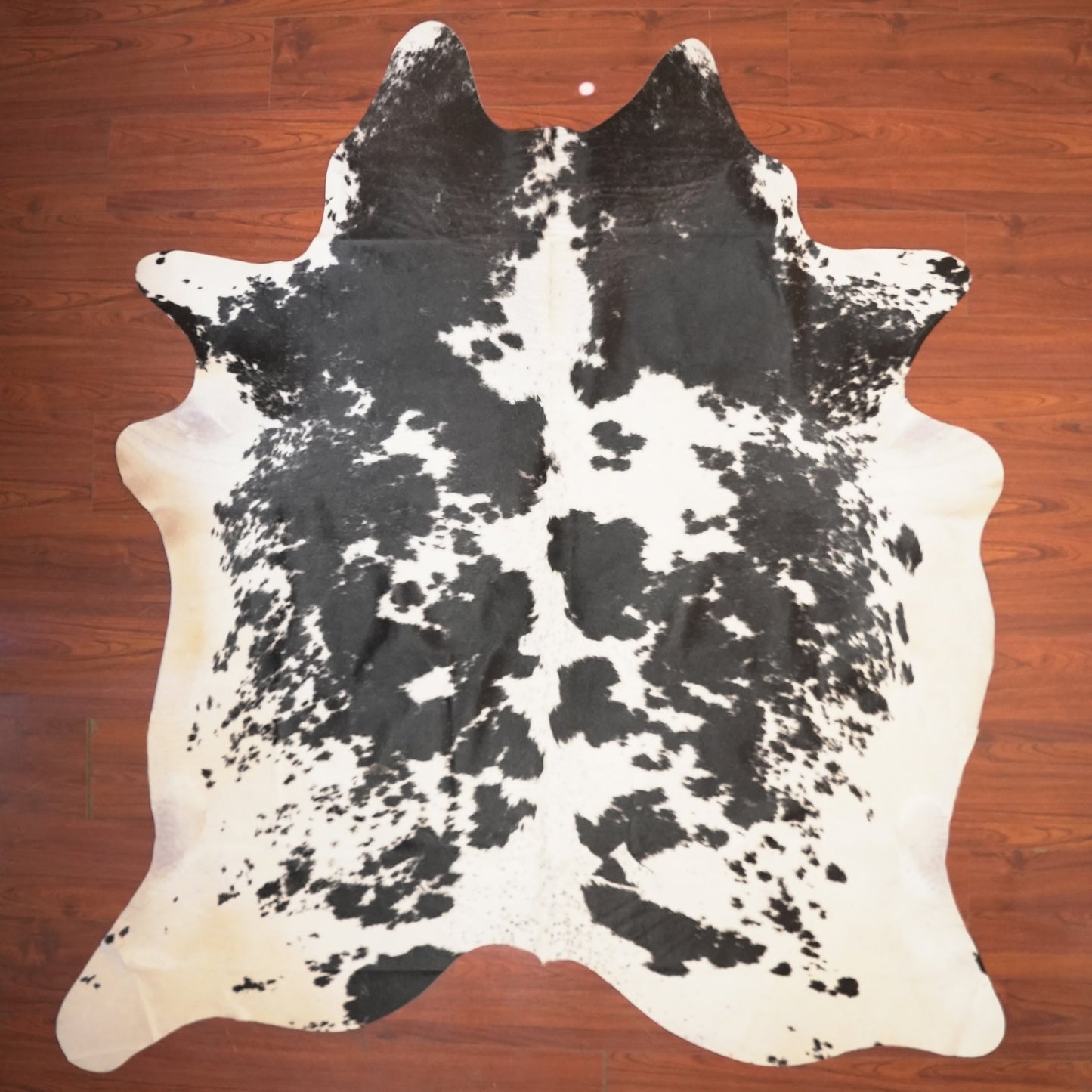 The Nguni Guy Nguni cowhide African decor Authentic cowhide Home decor Interior design Unique pattern Hand-selected Premium quality Natural beauty Exotic rug Genuine hide Statement piece Contemporary style Ethically sourced Sustainable decor Versatile accent Luxury rug Designer piece Modern aesthetic High-end craftsmanship Timeless elegance Designer home accents