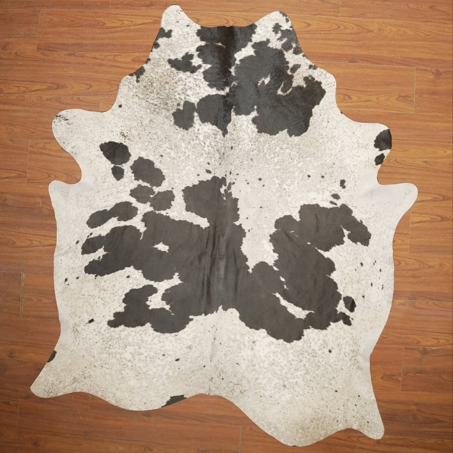 The Nguni Guy Nguni cowhide African decor Authentic cowhide Home decor Interior design Unique pattern Hand-selected Premium quality Natural beauty Exotic rug Genuine hide Statement piece Contemporary style Ethically sourced Sustainable decor Versatile accent Luxury rug Designer piece Modern aesthetic High-end craftsmanship Timeless elegance Designer home accents