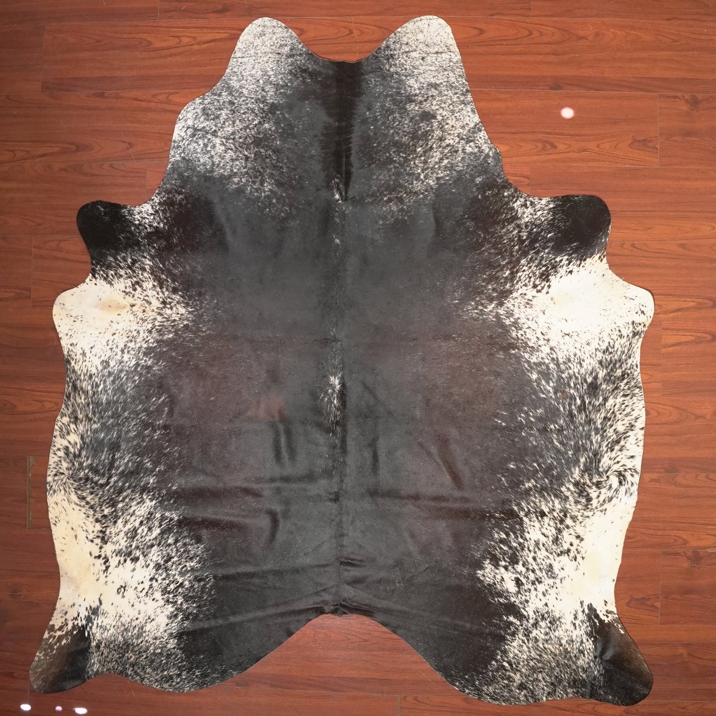 The Nguni Guy Nguni cowhide African decor Authentic cowhide Home decor Interior design Unique pattern Hand-selected Premium quality Natural beauty Exotic rug Genuine hide Statement piece Contemporary style Ethically sourced Sustainable decor Versatile accent Luxury rug Designer piece Modern aesthetic High-end craftsmanship Timeless elegance Designer home accents