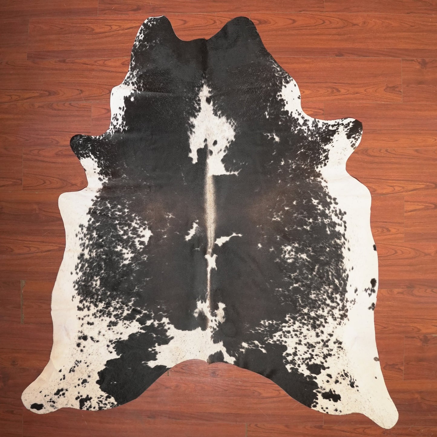 The Nguni Guy Nguni cowhide African decor Authentic cowhide Home decor Interior design Unique pattern Hand-selected Premium quality Natural beauty Exotic rug Genuine hide Statement piece Contemporary style Ethically sourced Sustainable decor Versatile accent Luxury rug Designer piece Modern aesthetic High-end craftsmanship Timeless elegance Designer home accents