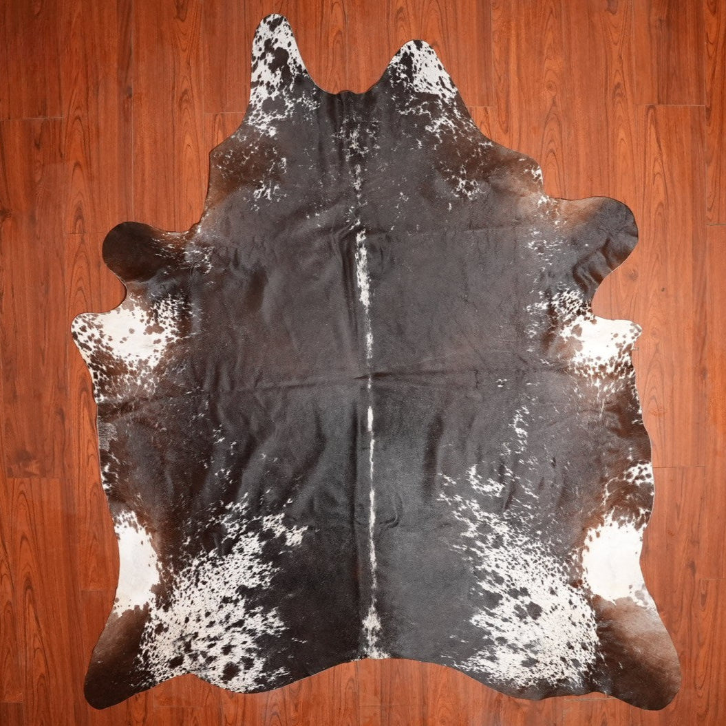The Nguni Guy Nguni cowhide African decor Authentic cowhide Home decor Interior design Unique pattern Hand-selected Premium quality Natural beauty Exotic rug Genuine hide Statement piece Contemporary style Ethically sourced Sustainable decor Versatile accent Luxury rug Designer piece Modern aesthetic High-end craftsmanship Timeless elegance Designer home accents