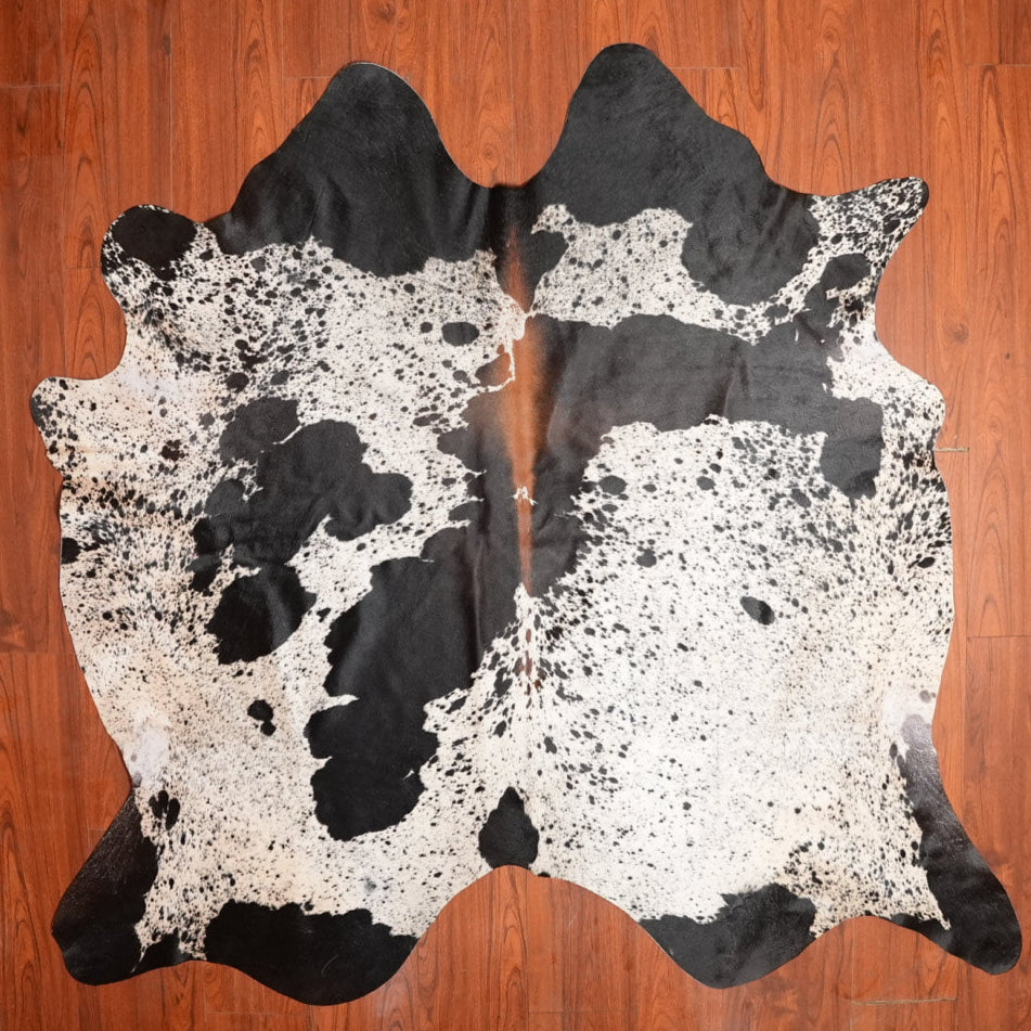 The Nguni Guy Nguni cowhide African decor Authentic cowhide Home decor Interior design Unique pattern Hand-selected Premium quality Natural beauty Exotic rug Genuine hide Statement piece Contemporary style Ethically sourced Sustainable decor Versatile accent Luxury rug Designer piece Modern aesthetic High-end craftsmanship Timeless elegance Designer home accents