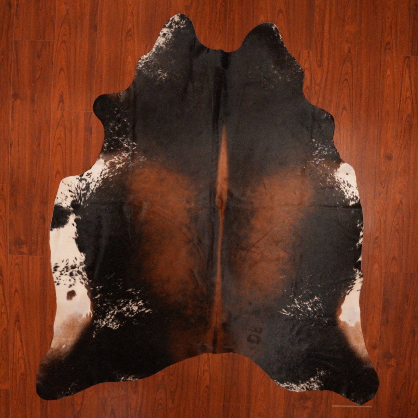 The Nguni Guy Nguni cowhide African decor Authentic cowhide Home decor Interior design Unique pattern Hand-selected Premium quality Natural beauty Exotic rug Genuine hide Statement piece Contemporary style Ethically sourced Sustainable decor Versatile accent Luxury rug Designer piece Modern aesthetic High-end craftsmanship Timeless elegance Designer home accents