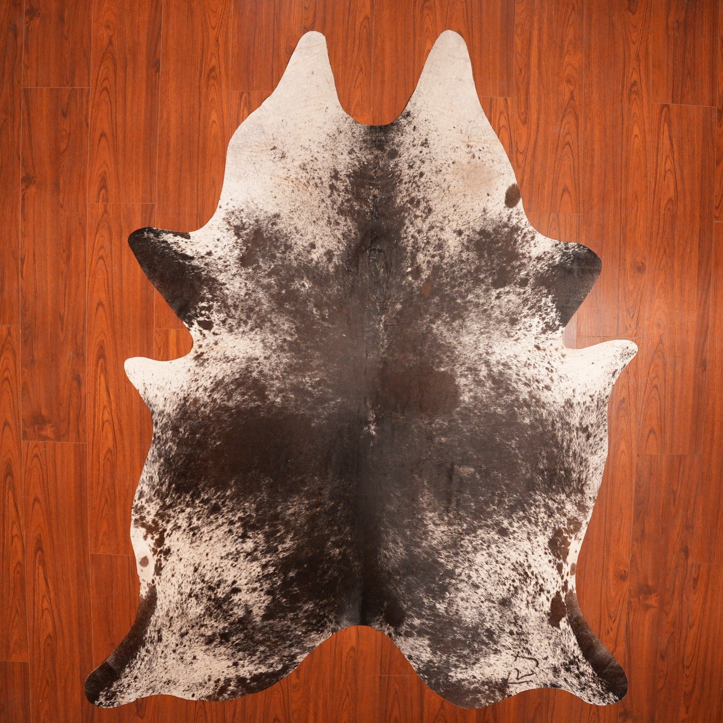 The Nguni Guy Nguni cowhide African decor Authentic cowhide Home decor Interior design Unique pattern Hand-selected Premium quality Natural beauty Exotic rug Genuine hide Statement piece Contemporary style Ethically sourced Sustainable decor Versatile accent Luxury rug Designer piece Modern aesthetic High-end craftsmanship Timeless elegance Designer home accents