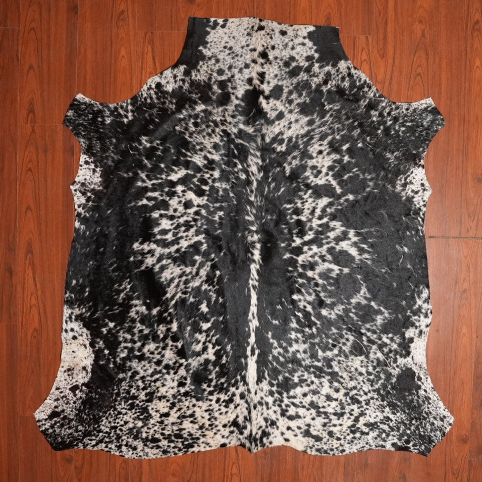 The Nguni Guy Nguni cowhide African decor Authentic cowhide Home decor Interior design Unique pattern Hand-selected Premium quality Natural beauty Exotic rug Genuine hide Statement piece Contemporary style Ethically sourced Sustainable decor Versatile accent Luxury rug Designer piece Modern aesthetic High-end craftsmanship Timeless elegance Designer home accents