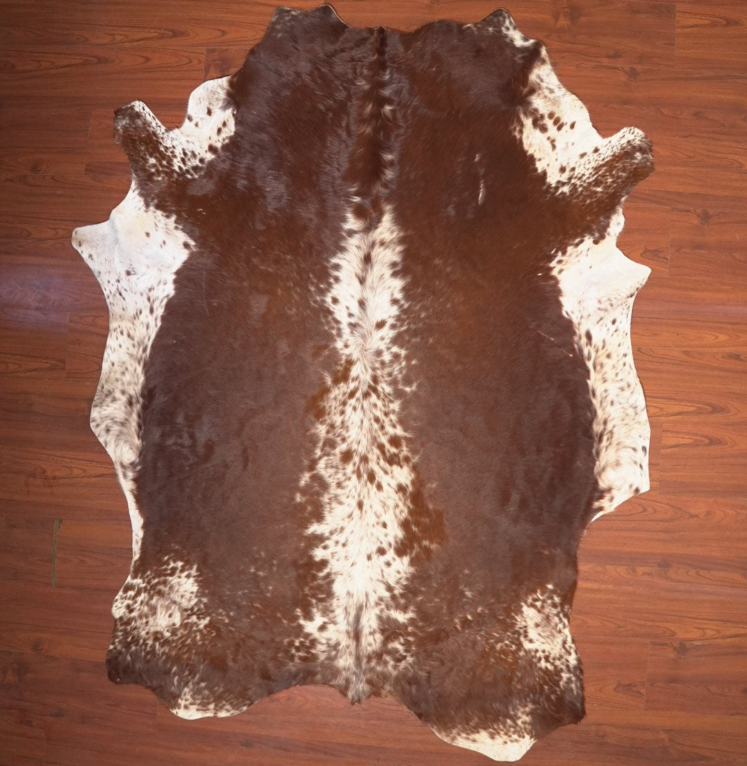 The Nguni Guy Nguni cowhide African decor Authentic cowhide Home decor Interior design Unique pattern Hand-selected Premium quality Natural beauty Exotic rug Genuine hide Statement piece Contemporary style Ethically sourced Sustainable decor Versatile accent Luxury rug Designer piece Modern aesthetic High-end craftsmanship Timeless elegance Designer home accents