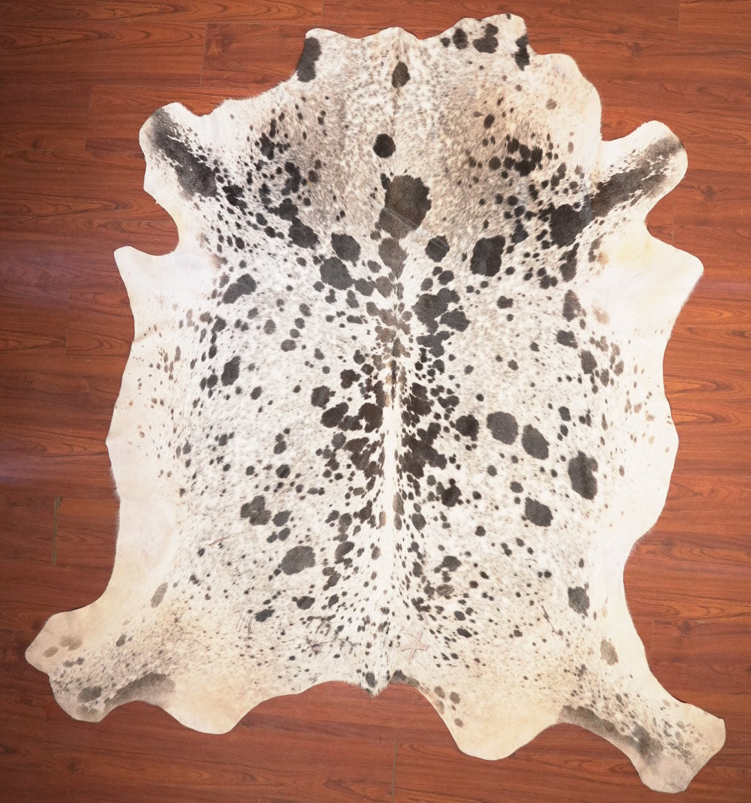 The Nguni Guy Nguni cowhide African decor Authentic cowhide Home decor Interior design Unique pattern Hand-selected Premium quality Natural beauty Exotic rug Genuine hide Statement piece Contemporary style Ethically sourced Sustainable decor Versatile accent Luxury rug Designer piece Modern aesthetic High-end craftsmanship Timeless elegance Designer home accents