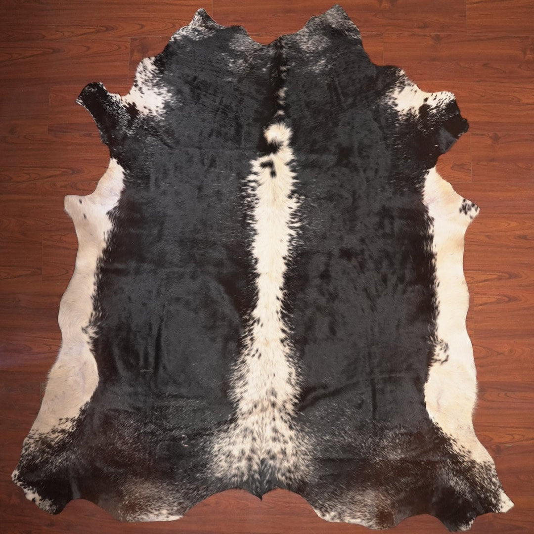 The Nguni Guy Nguni cowhide African decor Authentic cowhide Home decor Interior design Unique pattern Hand-selected Premium quality Natural beauty Exotic rug Genuine hide Statement piece Contemporary style Ethically sourced Sustainable decor Versatile accent Luxury rug Designer piece Modern aesthetic High-end craftsmanship Timeless elegance Designer home accents