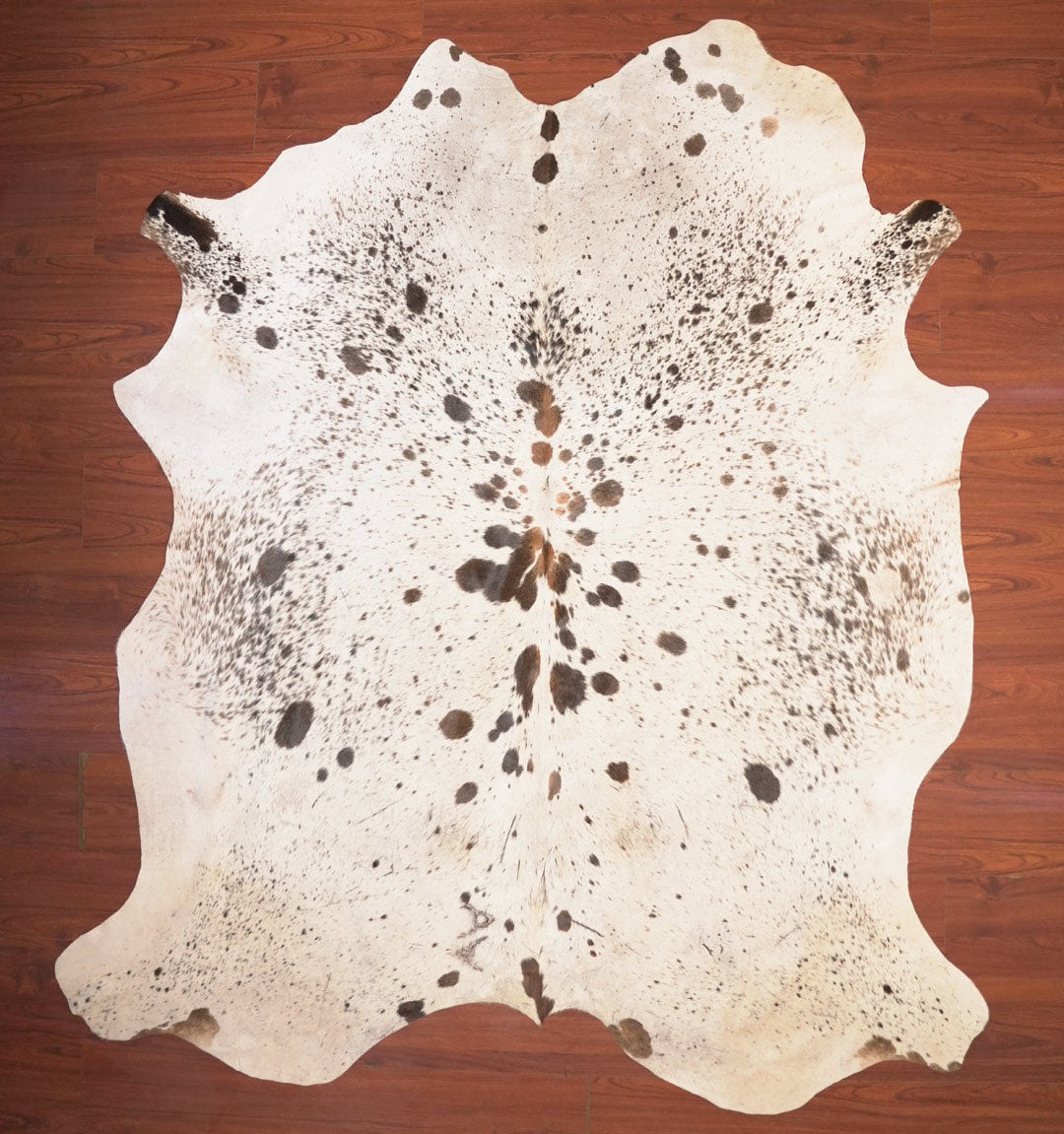 The Nguni Guy Nguni cowhide African decor Authentic cowhide Home decor Interior design Unique pattern Hand-selected Premium quality Natural beauty Exotic rug Genuine hide Statement piece Contemporary style Ethically sourced Sustainable decor Versatile accent Luxury rug Designer piece Modern aesthetic High-end craftsmanship Timeless elegance Designer home accents