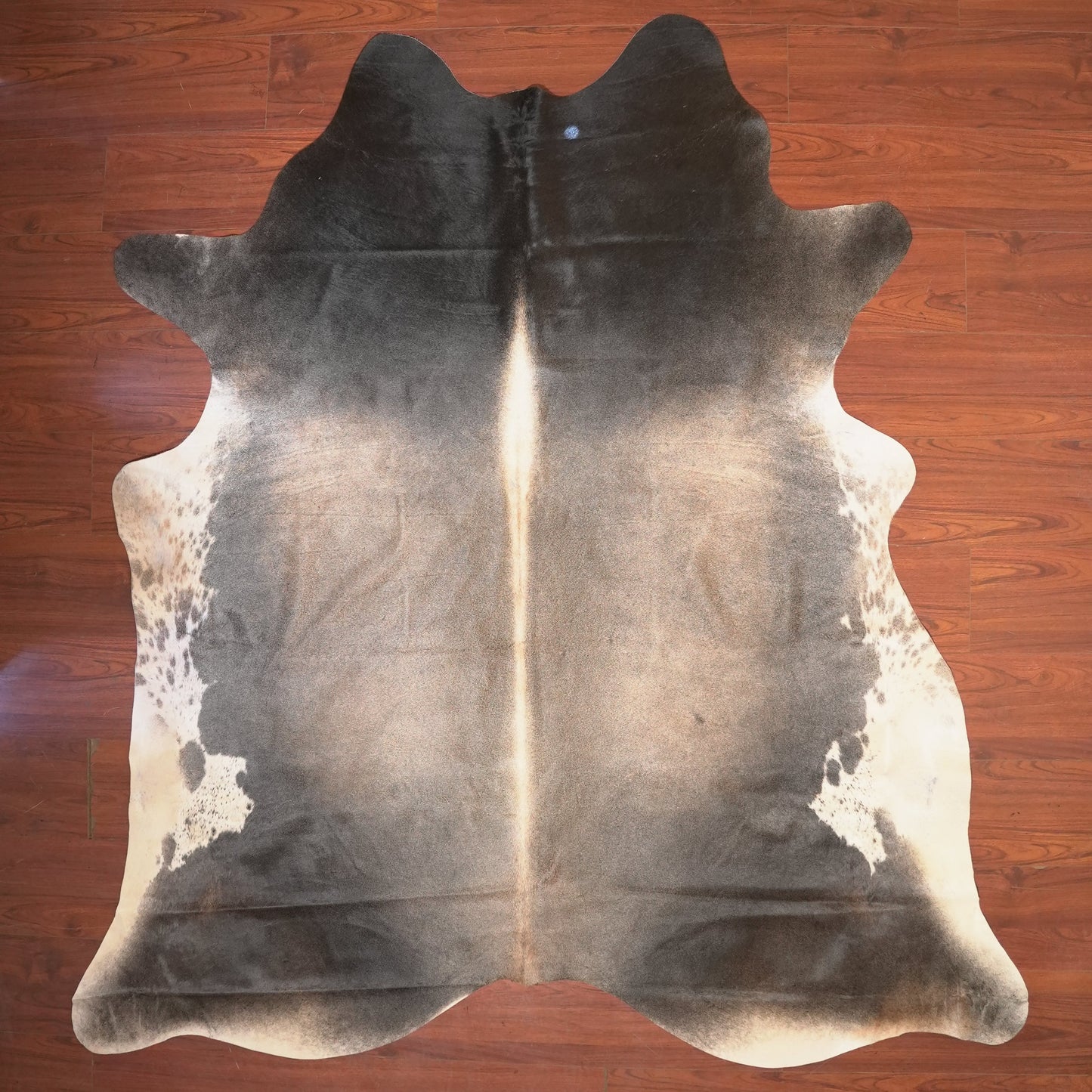 The Nguni Guy Nguni cowhide African decor Authentic cowhide Home decor Interior design Unique pattern Hand-selected Premium quality Natural beauty Exotic rug Genuine hide Statement piece Contemporary style Ethically sourced Sustainable decor Versatile accent Luxury rug Designer piece Modern aesthetic High-end craftsmanship Timeless elegance Designer home accents