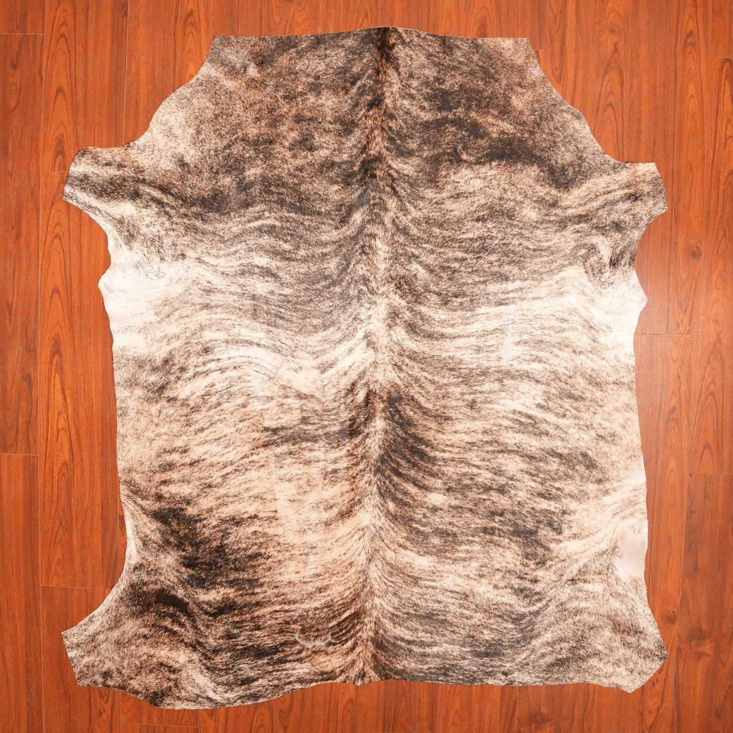 The Nguni Guy Nguni cowhide African decor Authentic cowhide Home decor Interior design Unique pattern Hand-selected Premium quality Natural beauty Exotic rug Genuine hide Statement piece Contemporary style Ethically sourced Sustainable decor Versatile accent Luxury rug Designer piece Modern aesthetic High-end craftsmanship Timeless elegance Designer home accents