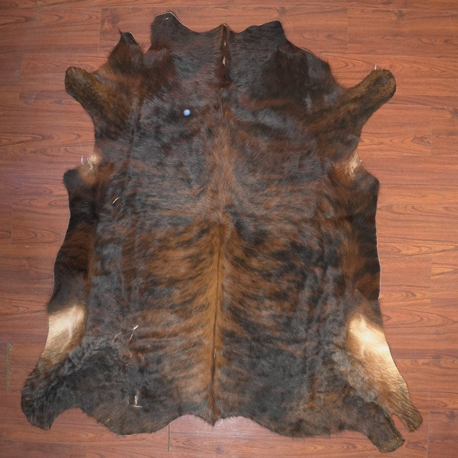 The Nguni Guy Nguni cowhide African decor Authentic cowhide Home decor Interior design Unique pattern Hand-selected Premium quality Natural beauty Exotic rug Genuine hide Statement piece Contemporary style Ethically sourced Sustainable decor Versatile accent Luxury rug Designer piece Modern aesthetic High-end craftsmanship Timeless elegance Designer home accents