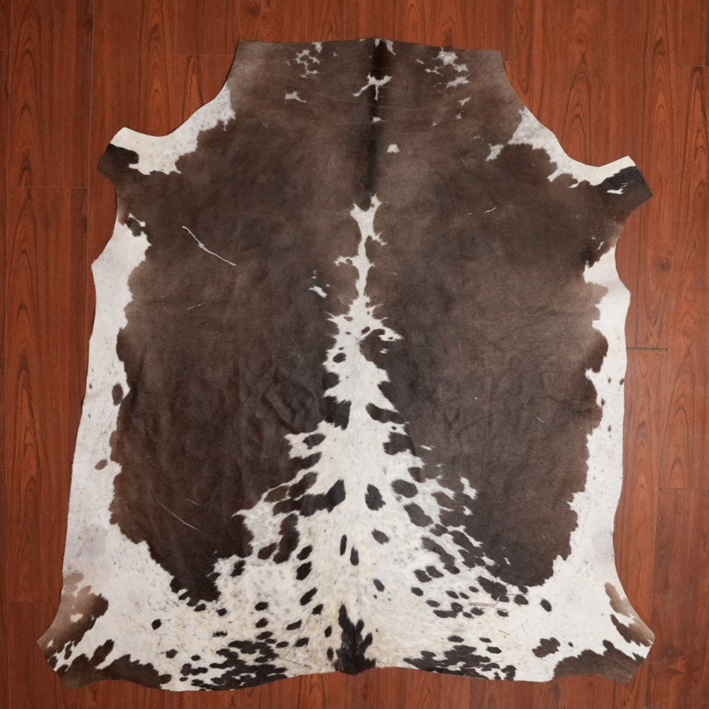 The Nguni Guy Nguni cowhide African decor Authentic cowhide Home decor Interior design Unique pattern Hand-selected Premium quality Natural beauty Exotic rug Genuine hide Statement piece Contemporary style Ethically sourced Sustainable decor Versatile accent Luxury rug Designer piece Modern aesthetic High-end craftsmanship Timeless elegance Designer home accents