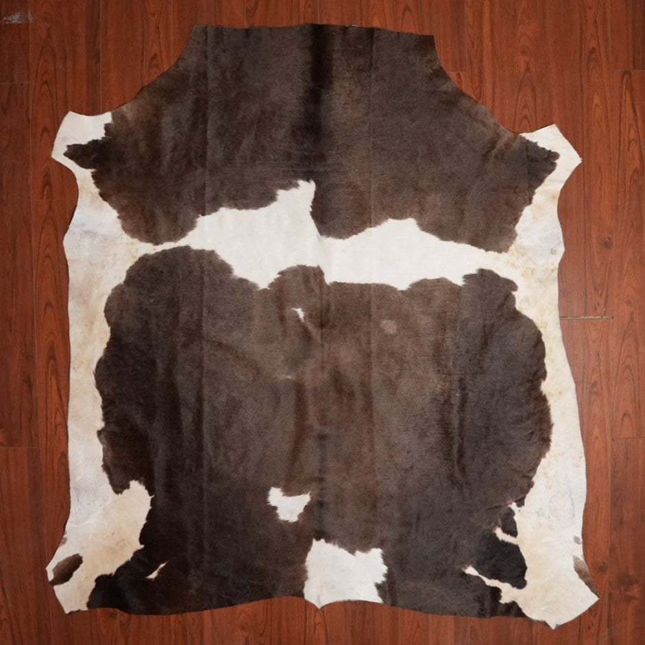 The Nguni Guy Nguni cowhide African decor Authentic cowhide Home decor Interior design Unique pattern Hand-selected Premium quality Natural beauty Exotic rug Genuine hide Statement piece Contemporary style Ethically sourced Sustainable decor Versatile accent Luxury rug Designer piece Modern aesthetic High-end craftsmanship Timeless elegance Designer home accents