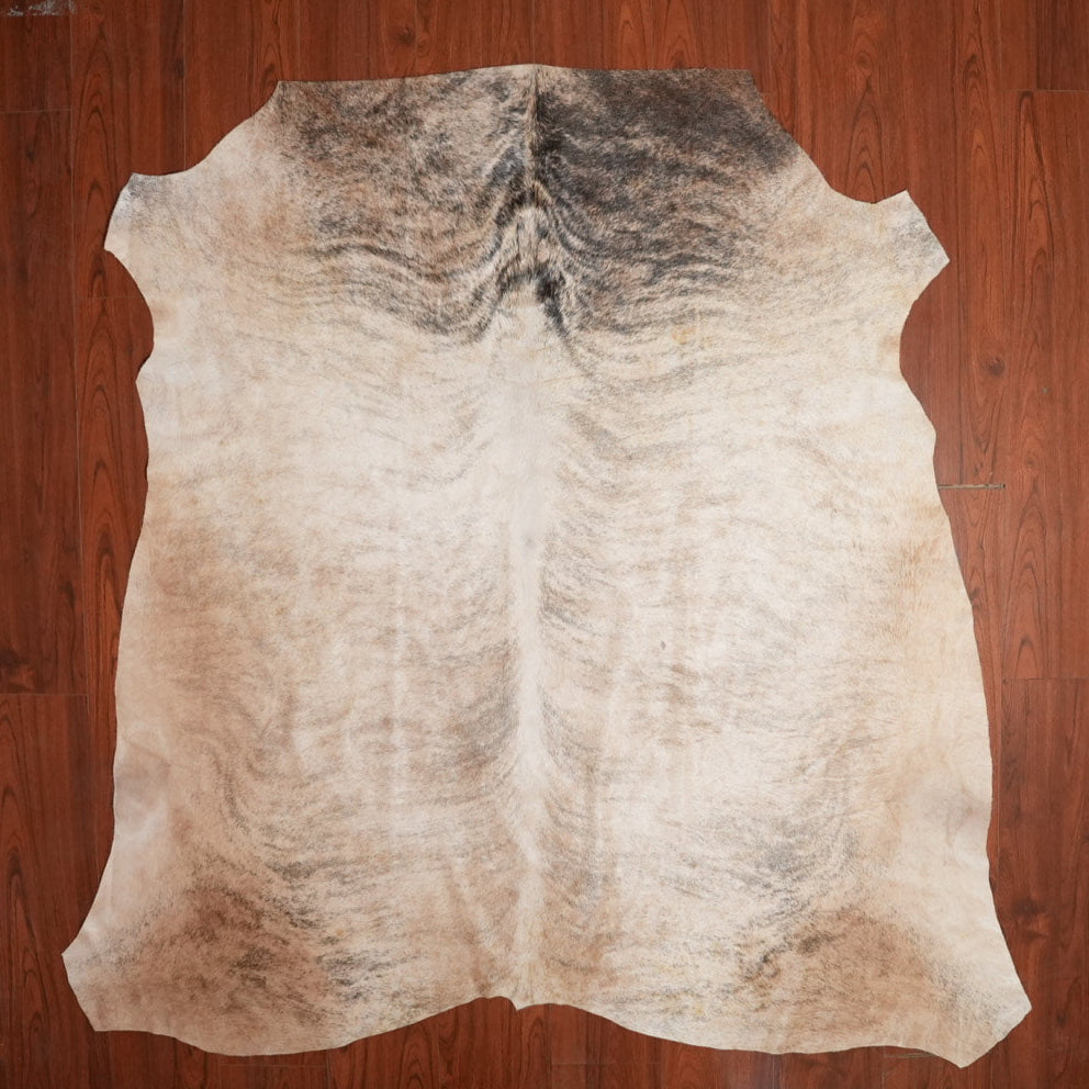 The Nguni Guy Nguni cowhide African decor Authentic cowhide Home decor Interior design Unique pattern Hand-selected Premium quality Natural beauty Exotic rug Genuine hide Statement piece Contemporary style Ethically sourced Sustainable decor Versatile accent Luxury rug Designer piece Modern aesthetic High-end craftsmanship Timeless elegance Designer home accents
