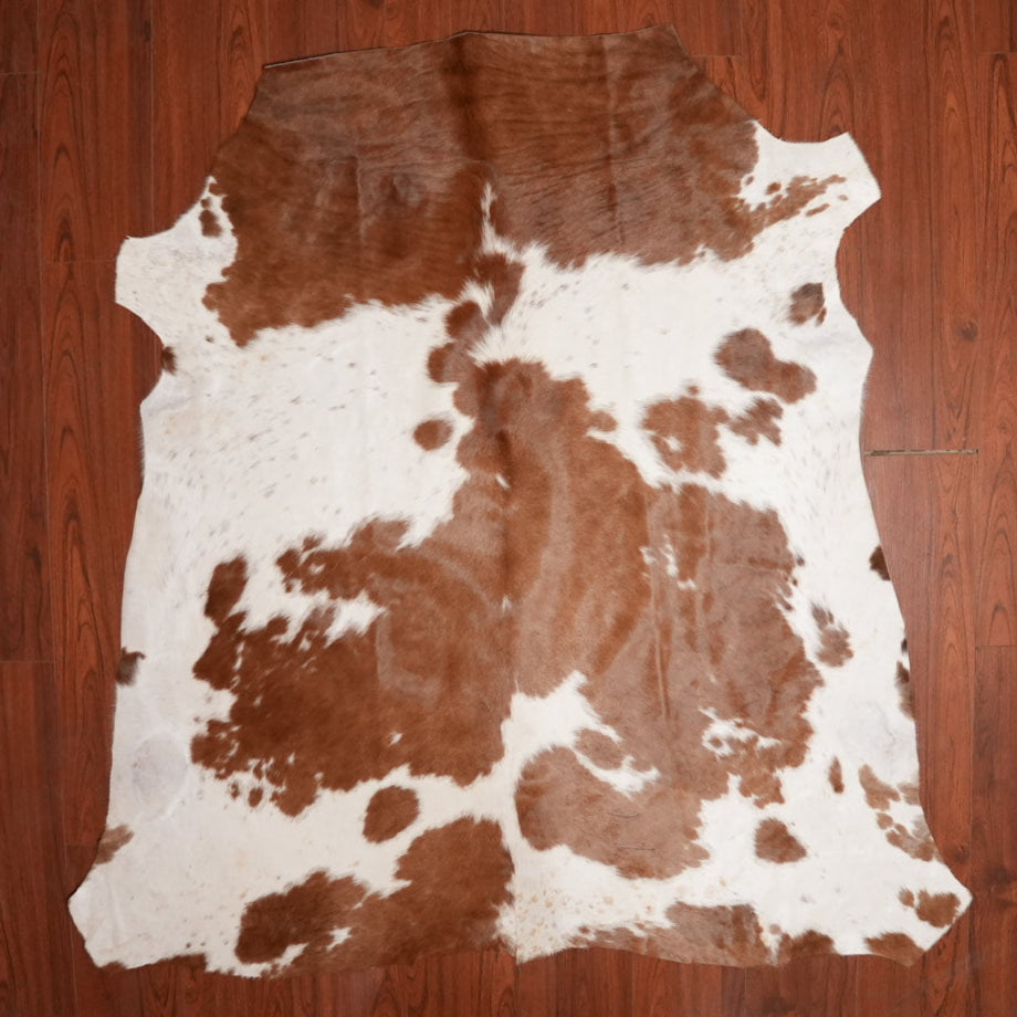 The Nguni Guy Nguni cowhide African decor Authentic cowhide Home decor Interior design Unique pattern Hand-selected Premium quality Natural beauty Exotic rug Genuine hide Statement piece Contemporary style Ethically sourced Sustainable decor Versatile accent Luxury rug Designer piece Modern aesthetic High-end craftsmanship Timeless elegance Designer home accents