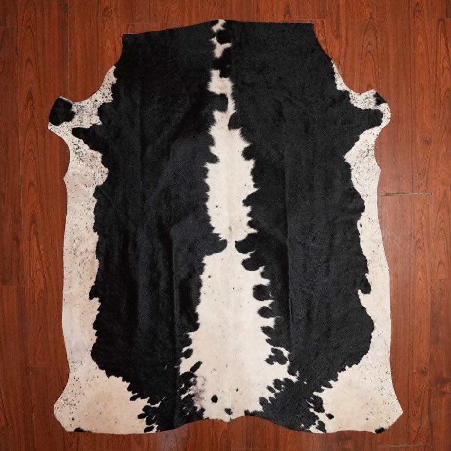 The Nguni Guy Nguni cowhide African decor Authentic cowhide Home decor Interior design Unique pattern Hand-selected Premium quality Natural beauty Exotic rug Genuine hide Statement piece Contemporary style Ethically sourced Sustainable decor Versatile accent Luxury rug Designer piece Modern aesthetic High-end craftsmanship Timeless elegance Designer home accents