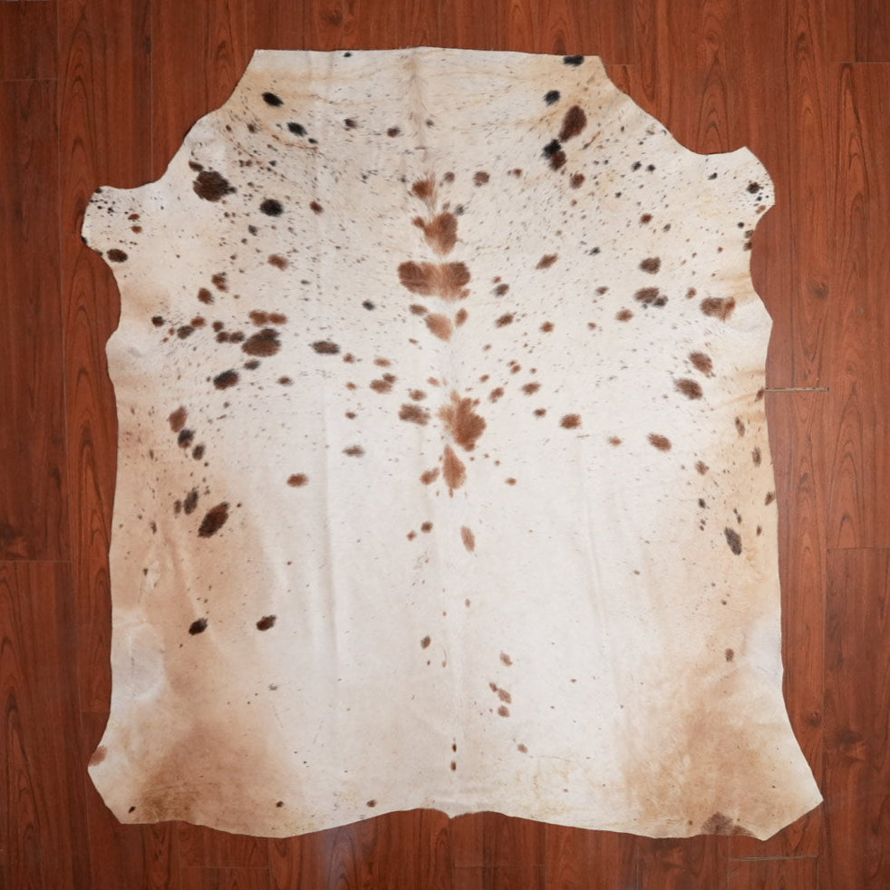 The Nguni Guy Nguni cowhide African decor Authentic cowhide Home decor Interior design Unique pattern Hand-selected Premium quality Natural beauty Exotic rug Genuine hide Statement piece Contemporary style Ethically sourced Sustainable decor Versatile accent Luxury rug Designer piece Modern aesthetic High-end craftsmanship Timeless elegance Designer home accents