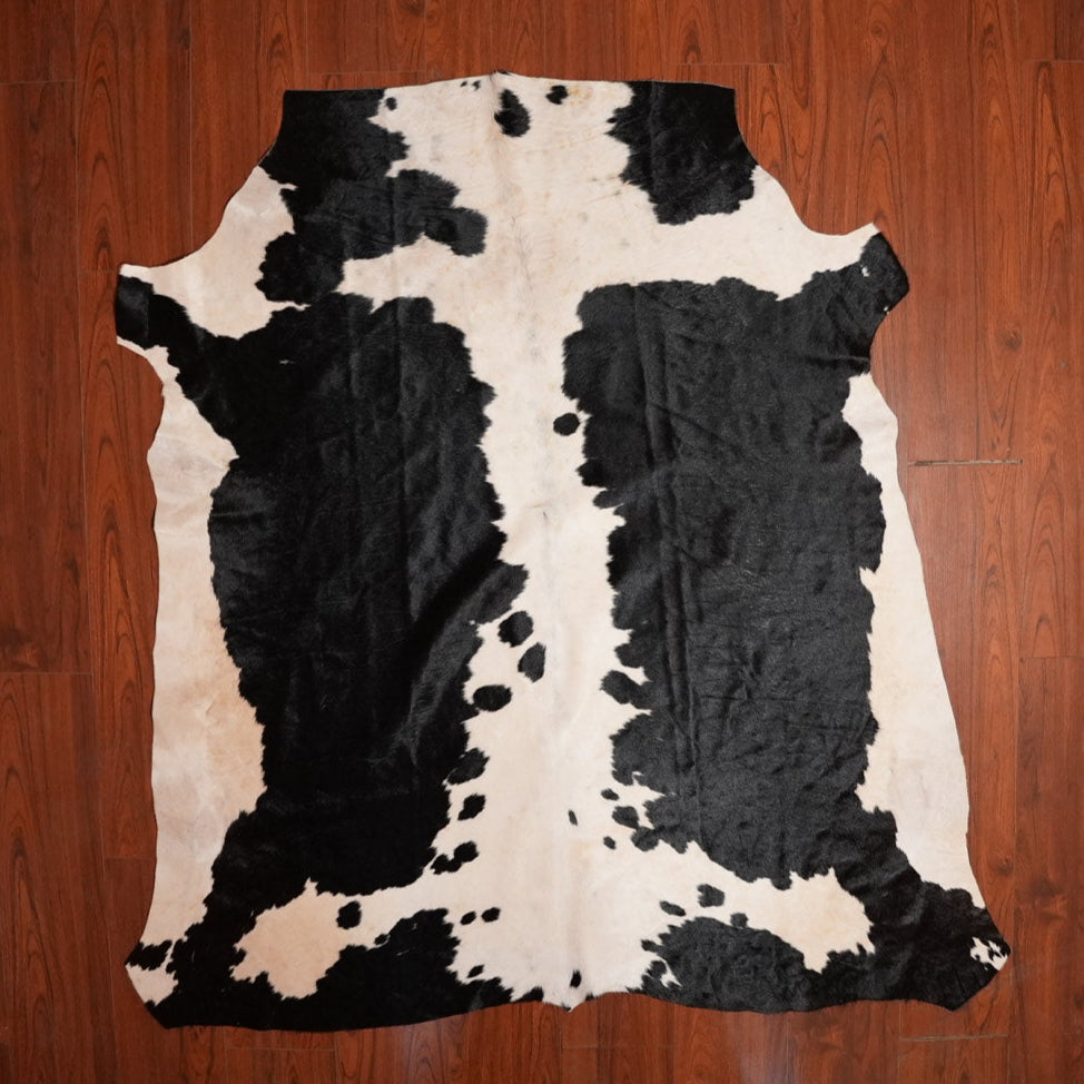 The Nguni Guy Nguni cowhide African decor Authentic cowhide Home decor Interior design Unique pattern Hand-selected Premium quality Natural beauty Exotic rug Genuine hide Statement piece Contemporary style Ethically sourced Sustainable decor Versatile accent Luxury rug Designer piece Modern aesthetic High-end craftsmanship Timeless elegance Designer home accents