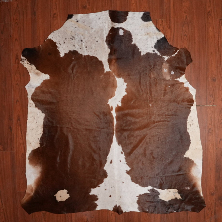 The Nguni Guy Nguni cowhide African decor Authentic cowhide Home decor Interior design Unique pattern Hand-selected Premium quality Natural beauty Exotic rug Genuine hide Statement piece Contemporary style Ethically sourced Sustainable decor Versatile accent Luxury rug Designer piece Modern aesthetic High-end craftsmanship Timeless elegance Designer home accents