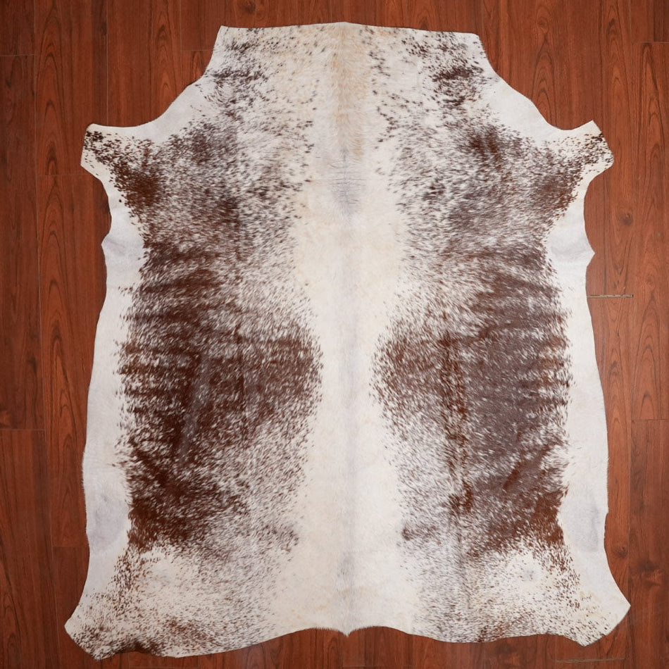 The Nguni Guy Nguni cowhide African decor Authentic cowhide Home decor Interior design Unique pattern Hand-selected Premium quality Natural beauty Exotic rug Genuine hide Statement piece Contemporary style Ethically sourced Sustainable decor Versatile accent Luxury rug Designer piece Modern aesthetic High-end craftsmanship Timeless elegance Designer home accents