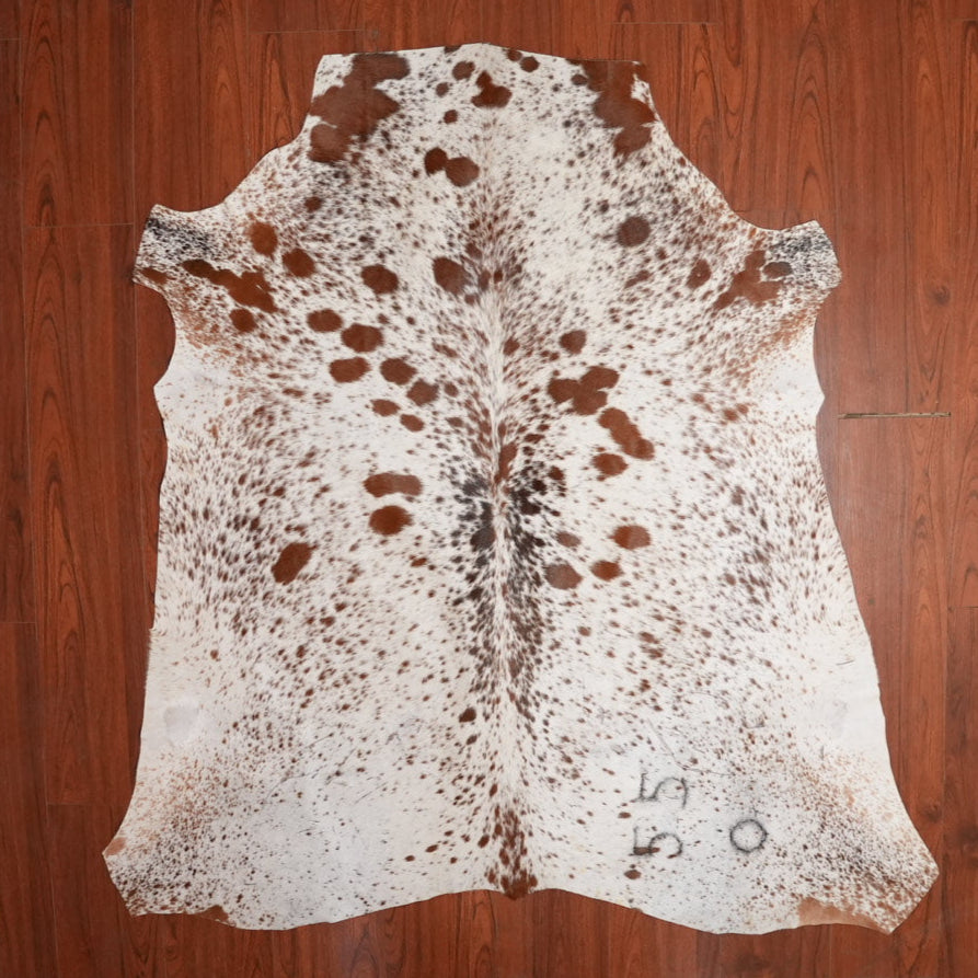 The Nguni Guy Nguni cowhide African decor Authentic cowhide Home decor Interior design Unique pattern Hand-selected Premium quality Natural beauty Exotic rug Genuine hide Statement piece Contemporary style Ethically sourced Sustainable decor Versatile accent Luxury rug Designer piece Modern aesthetic High-end craftsmanship Timeless elegance Designer home accents