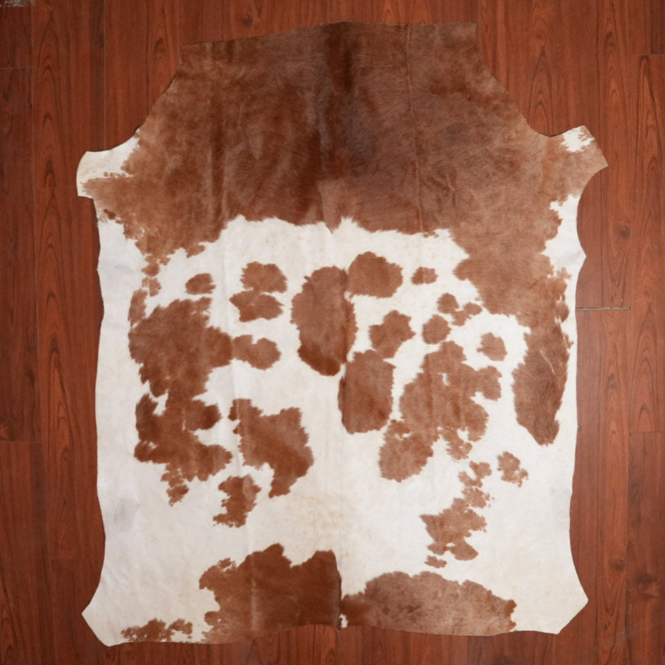 The Nguni Guy Nguni cowhide African decor Authentic cowhide Home decor Interior design Unique pattern Hand-selected Premium quality Natural beauty Exotic rug Genuine hide Statement piece Contemporary style Ethically sourced Sustainable decor Versatile accent Luxury rug Designer piece Modern aesthetic High-end craftsmanship Timeless elegance Designer home accents