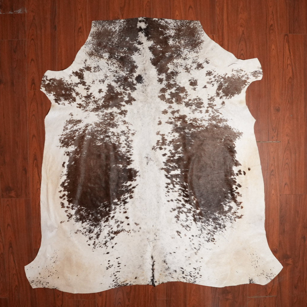 The Nguni Guy Nguni cowhide African decor Authentic cowhide Home decor Interior design Unique pattern Hand-selected Premium quality Natural beauty Exotic rug Genuine hide Statement piece Contemporary style Ethically sourced Sustainable decor Versatile accent Luxury rug Designer piece Modern aesthetic High-end craftsmanship Timeless elegance Designer home accents
