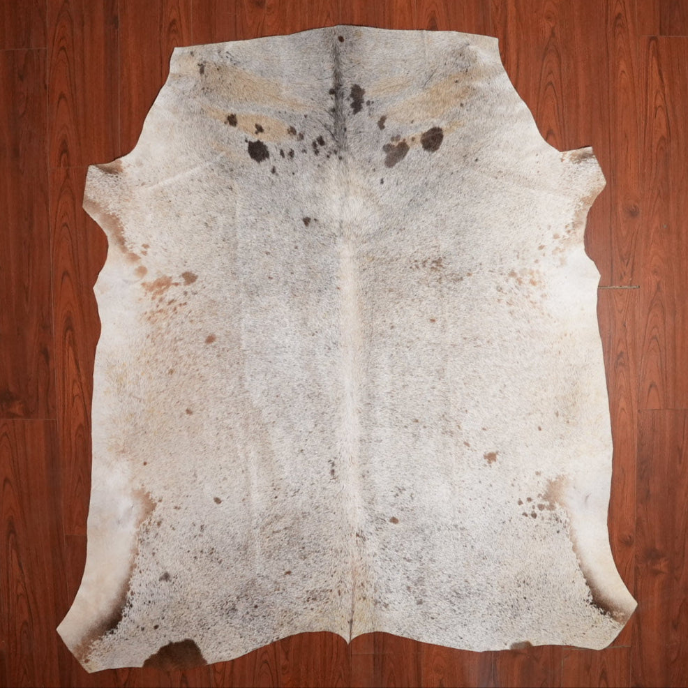 The Nguni Guy Nguni cowhide African decor Authentic cowhide Home decor Interior design Unique pattern Hand-selected Premium quality Natural beauty Exotic rug Genuine hide Statement piece Contemporary style Ethically sourced Sustainable decor Versatile accent Luxury rug Designer piece Modern aesthetic High-end craftsmanship Timeless elegance Designer home accents