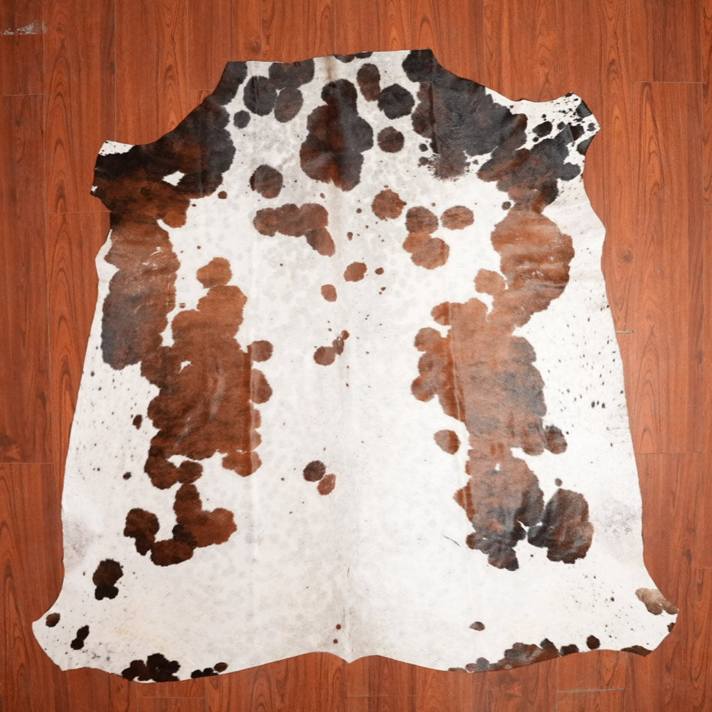 The Nguni Guy Nguni cowhide African decor Authentic cowhide Home decor Interior design Unique pattern Hand-selected Premium quality Natural beauty Exotic rug Genuine hide Statement piece Contemporary style Ethically sourced Sustainable decor Versatile accent Luxury rug Designer piece Modern aesthetic High-end craftsmanship Timeless elegance Designer home accents