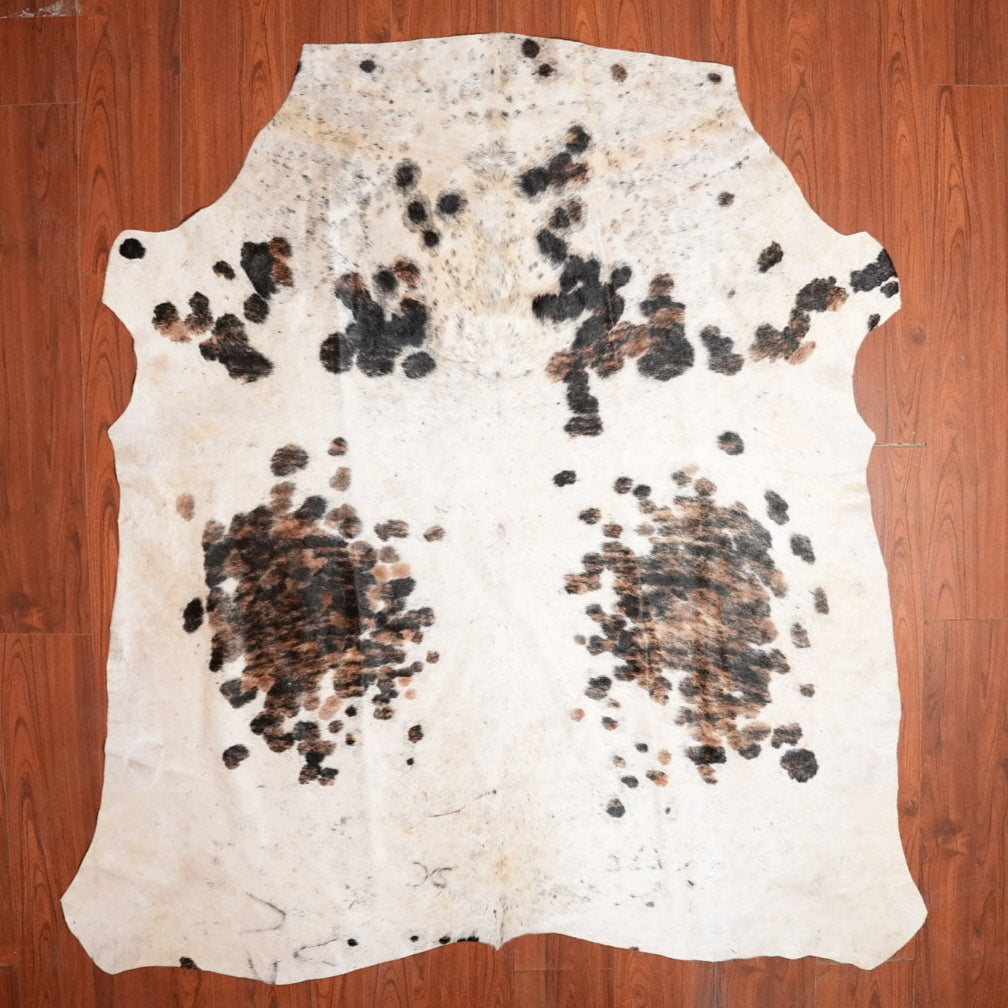 The Nguni Guy Nguni cowhide African decor Authentic cowhide Home decor Interior design Unique pattern Hand-selected Premium quality Natural beauty Exotic rug Genuine hide Statement piece Contemporary style Ethically sourced Sustainable decor Versatile accent Luxury rug Designer piece Modern aesthetic High-end craftsmanship Timeless elegance Designer home accents