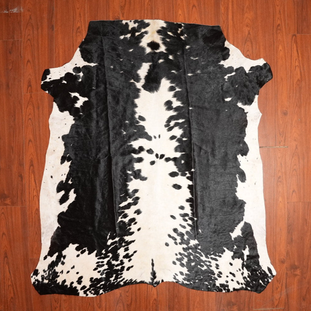 The Nguni Guy Nguni cowhide African decor Authentic cowhide Home decor Interior design Unique pattern Hand-selected Premium quality Natural beauty Exotic rug Genuine hide Statement piece Contemporary style Ethically sourced Sustainable decor Versatile accent Luxury rug Designer piece Modern aesthetic High-end craftsmanship Timeless elegance Designer home accents